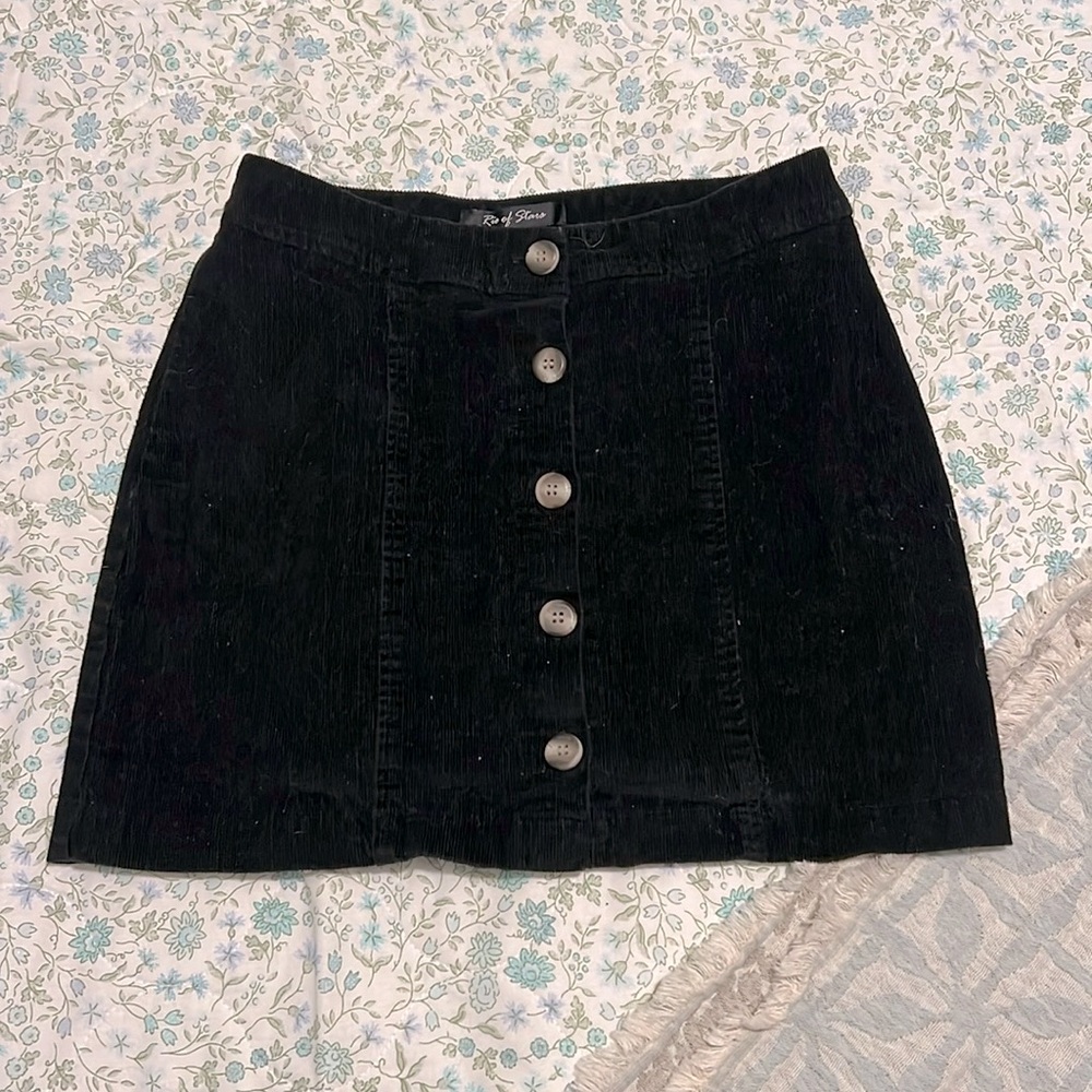 black mini skirt barely worn buttons on front